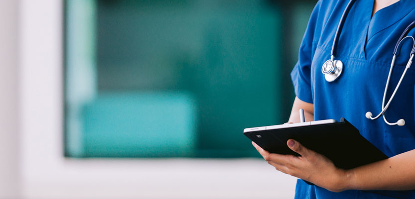 Clinical Nurse with tablet